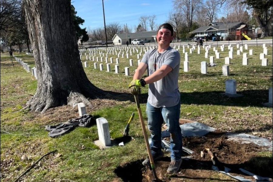 Joe completing Unmarked Headstone Project